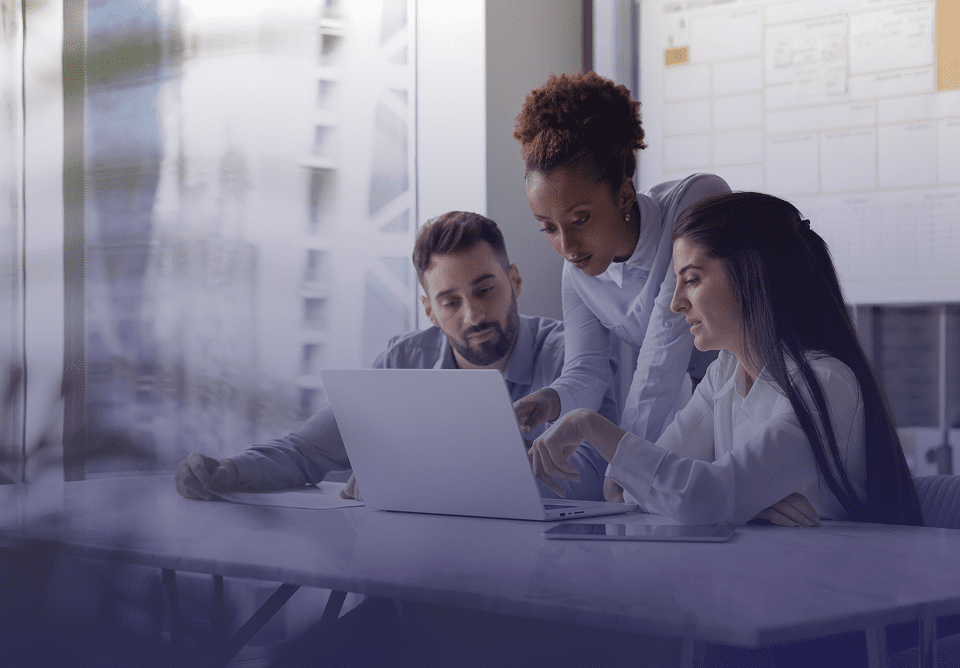 Office workers discussing project