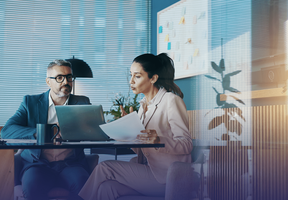 Business meeting with laptop and documents