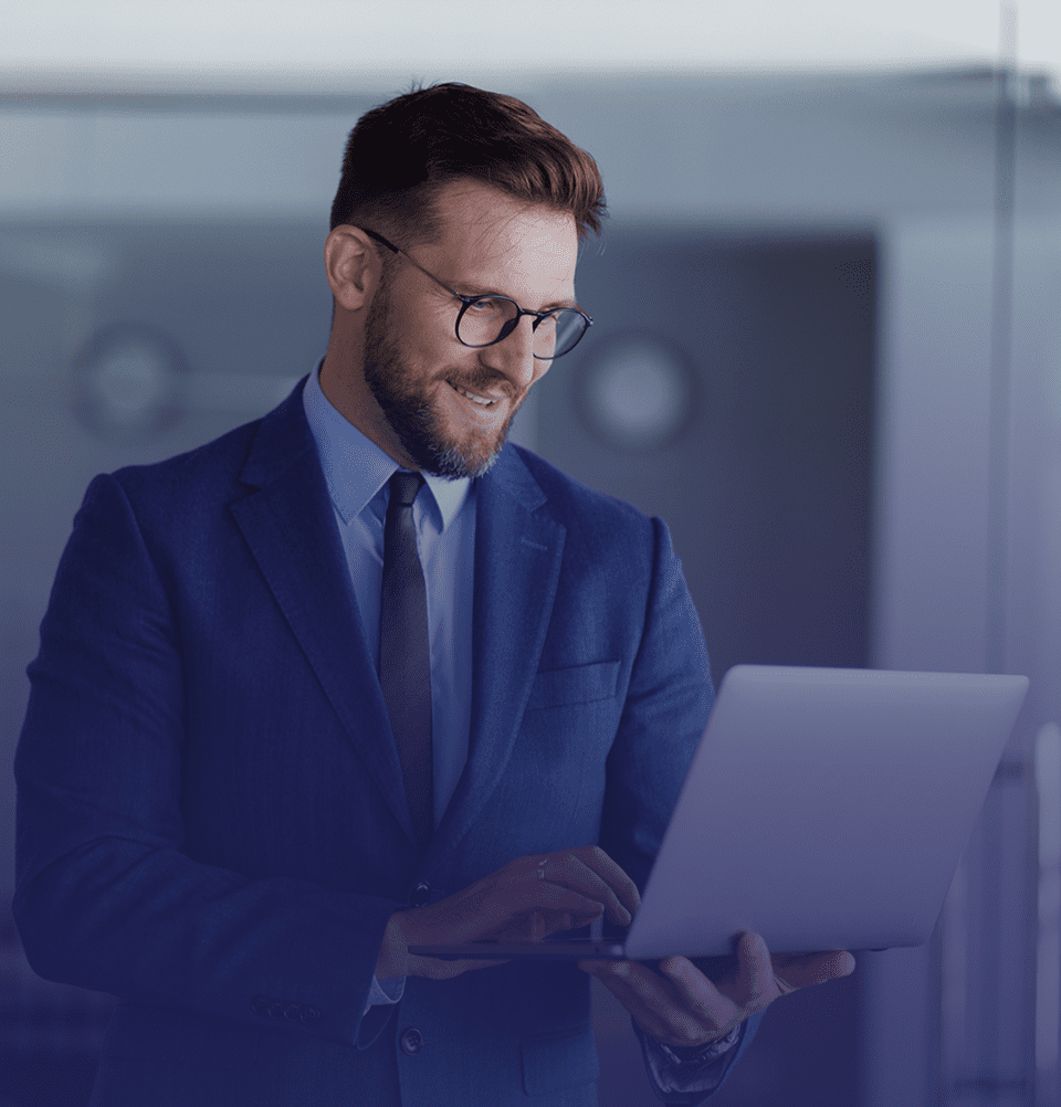 Man using laptop in office