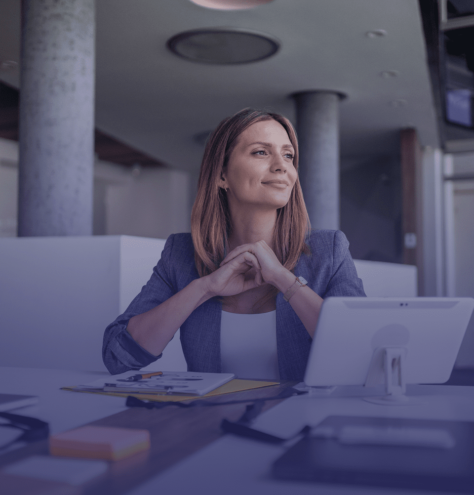 Woman at desk with tablet